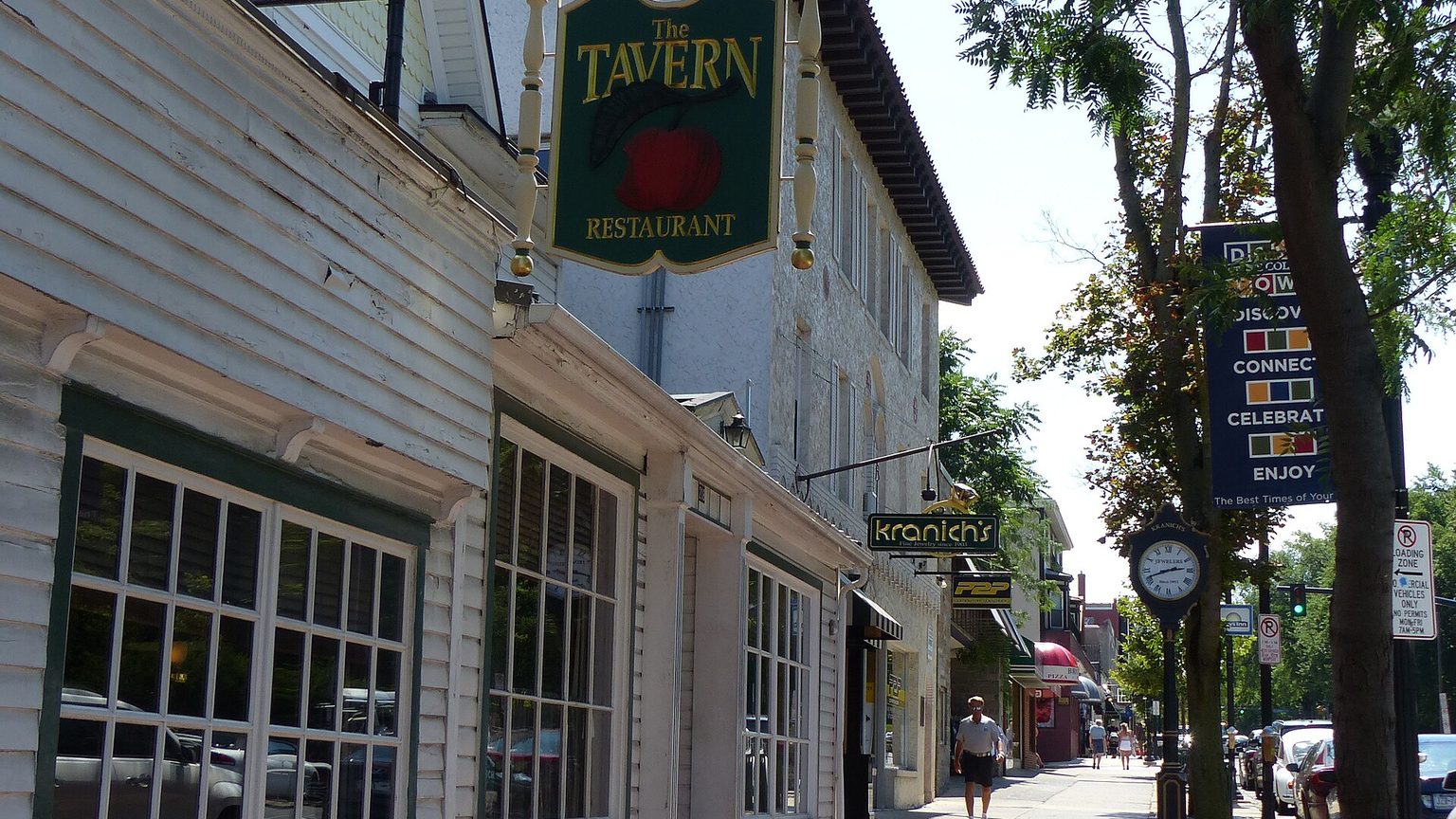 Sidewalk and storefronts in downtown State College, Pennsylvania, within walking distance of the Penn State University Park campus.